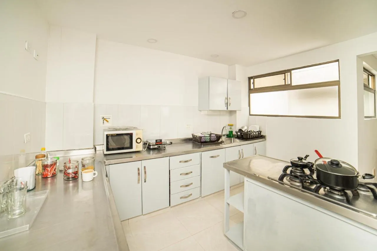 Apartamento Tu Refugio Acogedor En El Corazon De Medellin Hab Privada A Habitación en casa particular